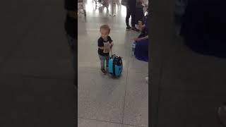 Toddler at the airport- cool boy ( Petey was 17m3w old )