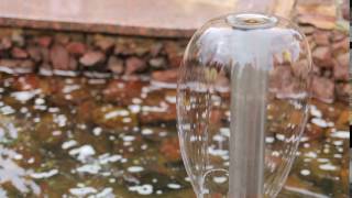 The fountain in the pond the summer