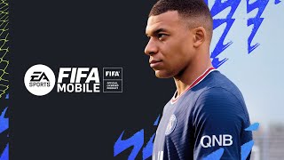 Playing Fifa Mobile.