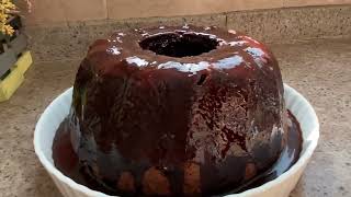 Black cake with chocolate sauce