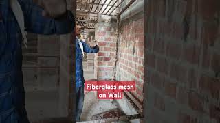 Fiberglass mesh installation on wall