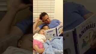 Daddy reading book for babies (Mia was 4m3w old)