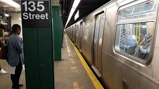 Metropolitan Avenue bound M train departing 135 Street