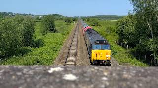 50008 "Thunderer" and 67028  pass under exminster overpass 27/5/23