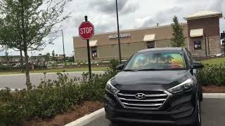 Golf cart ride from Magnolia Plaza to McClure. McDonald's opens tomorrow. The Villages, Florida