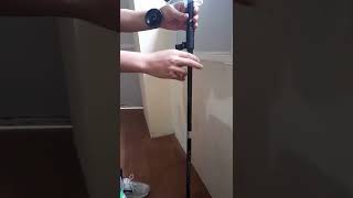 Unboxing trifold trekking stick.