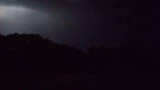 huge lightning strikes on the farm with almost cyan light