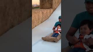 Dad and my brother in the Giant slide | Giant Hay Bales Slide.