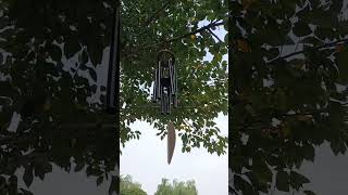 Black Leaf wind chime hanging on the tree. #gardendecor #gardendecorideas