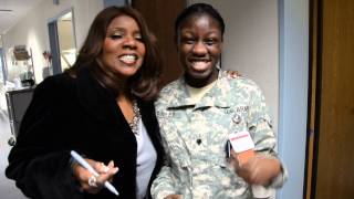 Gloria Gaynor sings with Spc  Neona Bailey, an Army medic at LRMC