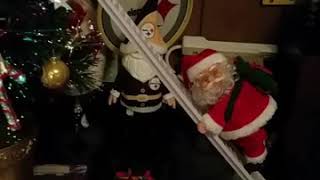 MUSICAL LADDER CLIMBING SANTA .....