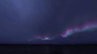 ( CGI 4k Stock Footage ) Stormy blue magenta aurora borealis