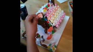 Duncan and Anthony build a Gingerbread House