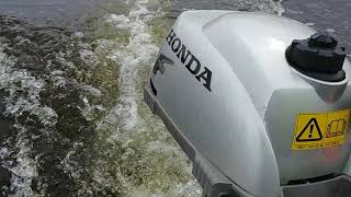 Honda Marine. 4 stroke boat engine on action