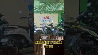 Mural di pagar sebuah sekolah swasta