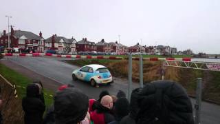 Chris Ford in a Subaru Impreza WRC followed by Ian Forgan in a Ford KA