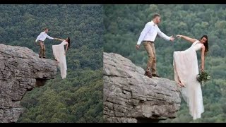 Noivos se arriscaram na beira do penhasco para tirar a foto perfeita; mas soltaram as mãos..Ver mais