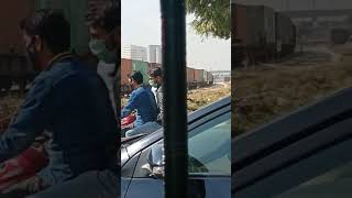 Cargo Train passing National Bank of Pakistan Head Office. Karachi  Railway crossing