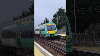 Class 171 passes Pevensey Bay