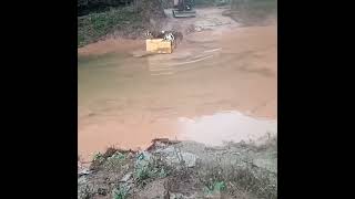 Crawler dumper across the water when transport wood.