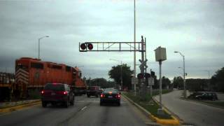 HD: Car Nearly gets Hit by 2 EJ&E locomotives at Wood Dale Il.