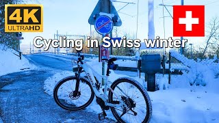 Snowy Swiss Cycling Adventure: Ride through winter landscapes. With relaxing music