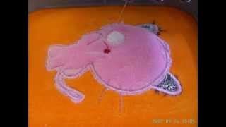 Customs digitizing & embroidered applique in a baby coat, funny kitty.