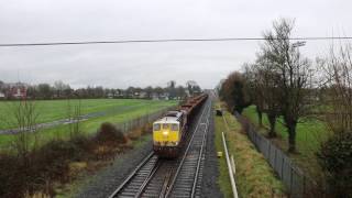 Iarnród Éireann 075+log train departing from Kildare